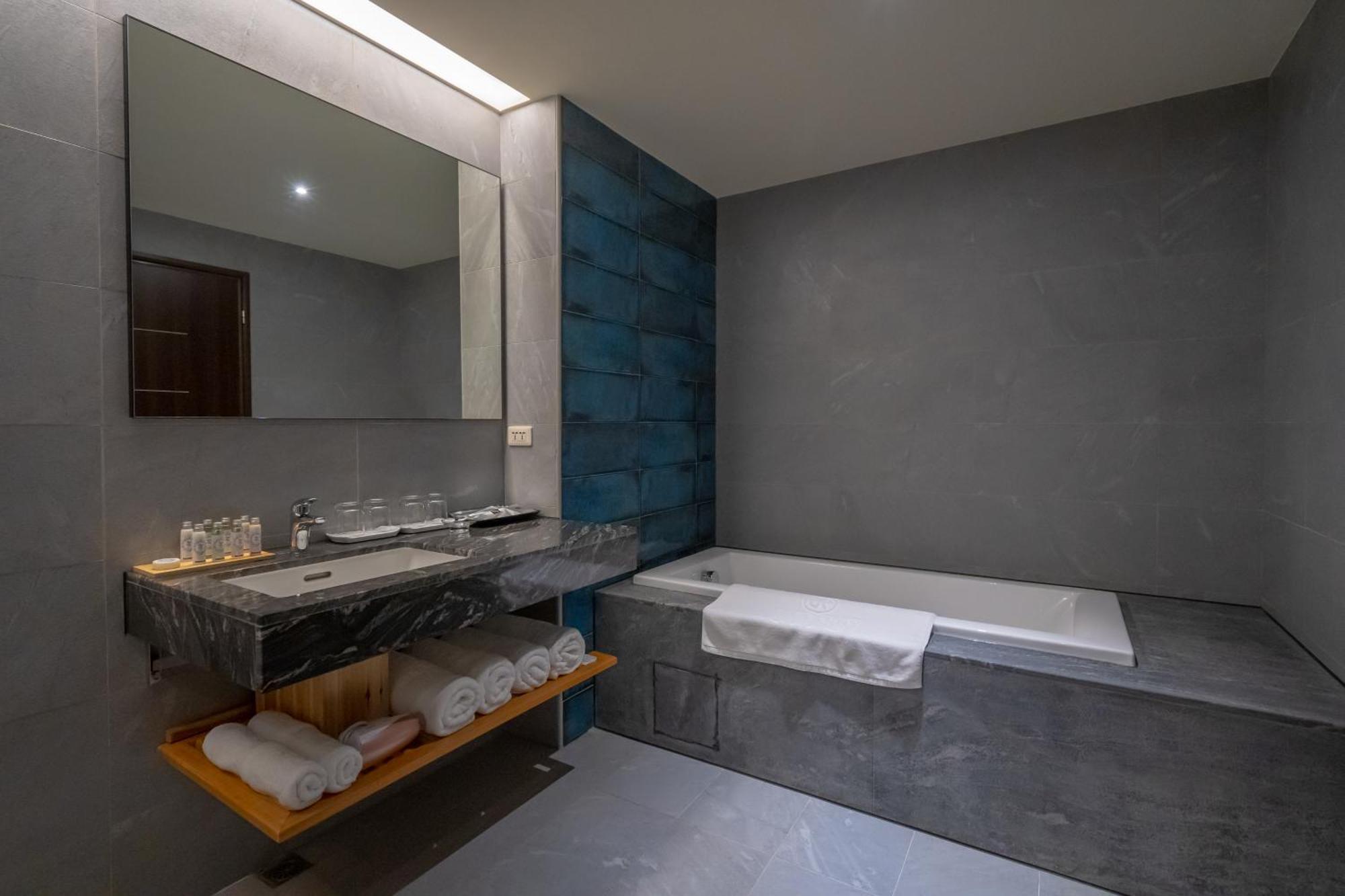 รีแล็กชัวรี บีช เฮาส์ Apartment หนานวาน ห้อง รูปภาพ