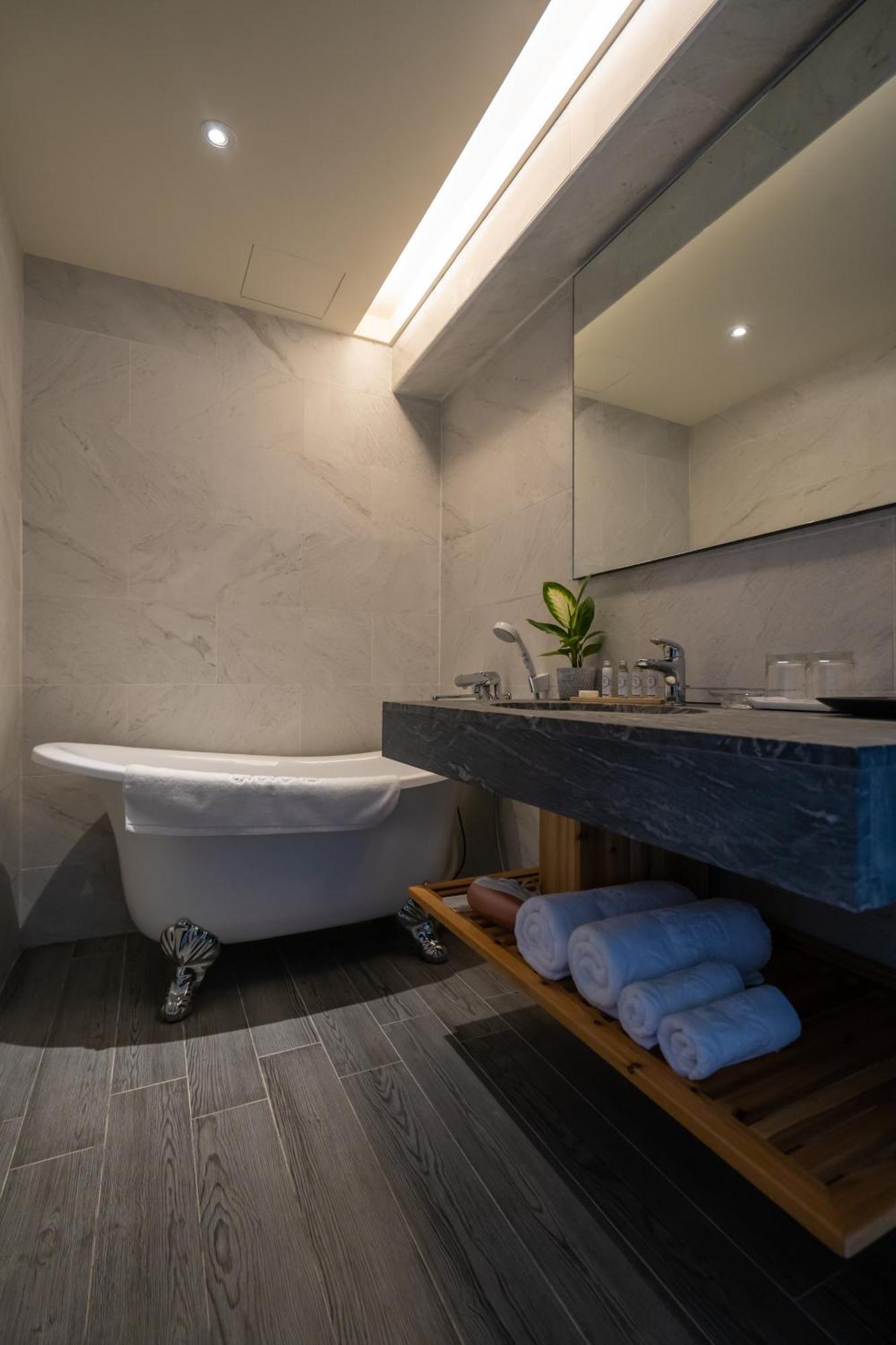 รีแล็กชัวรี บีช เฮาส์ Apartment หนานวาน ห้อง รูปภาพ