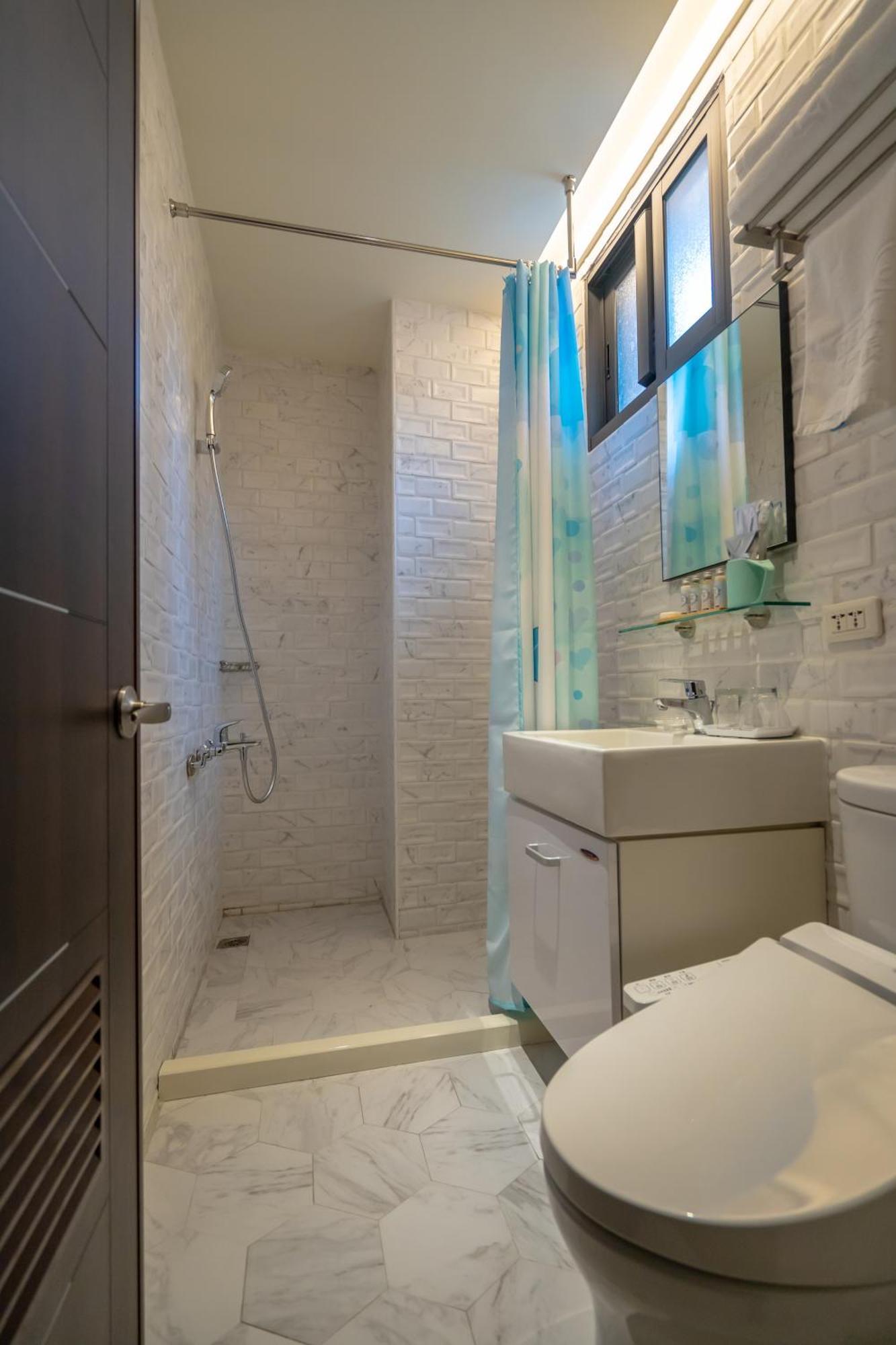 รีแล็กชัวรี บีช เฮาส์ Apartment หนานวาน ห้อง รูปภาพ